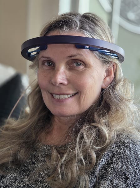 A participant wearing the Fareon headset during the clinical study
